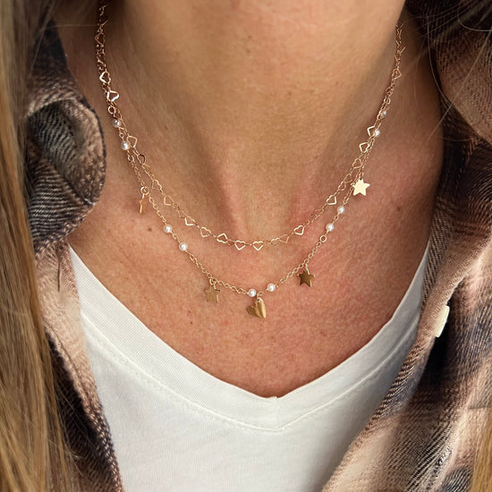 Collana due fili cuori vuoti, perle e pendenti stella e cuore - Lumiere Bijoux
