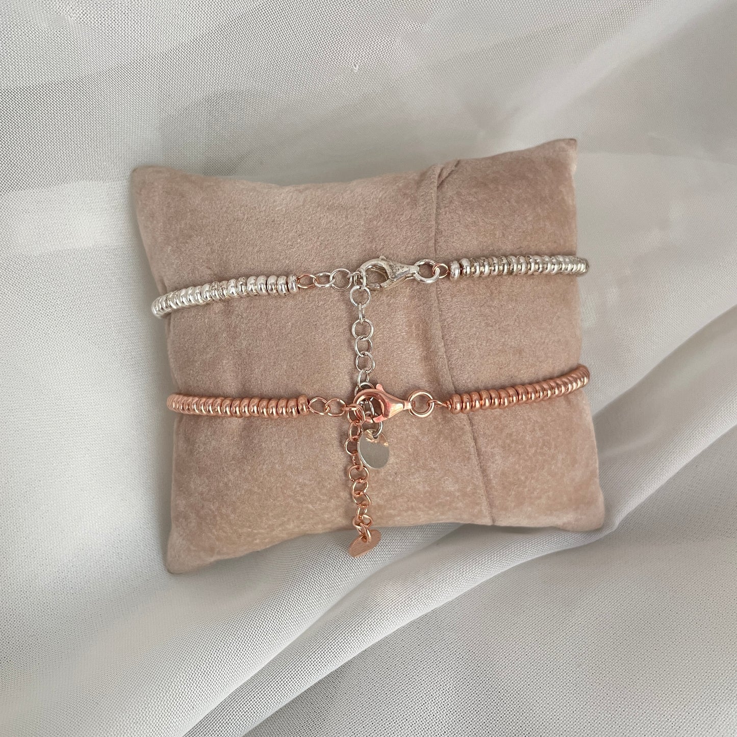 Bracciale in argento o rosè con cuori intrecciati rosé - pezzi unici - Lumiere Bijoux