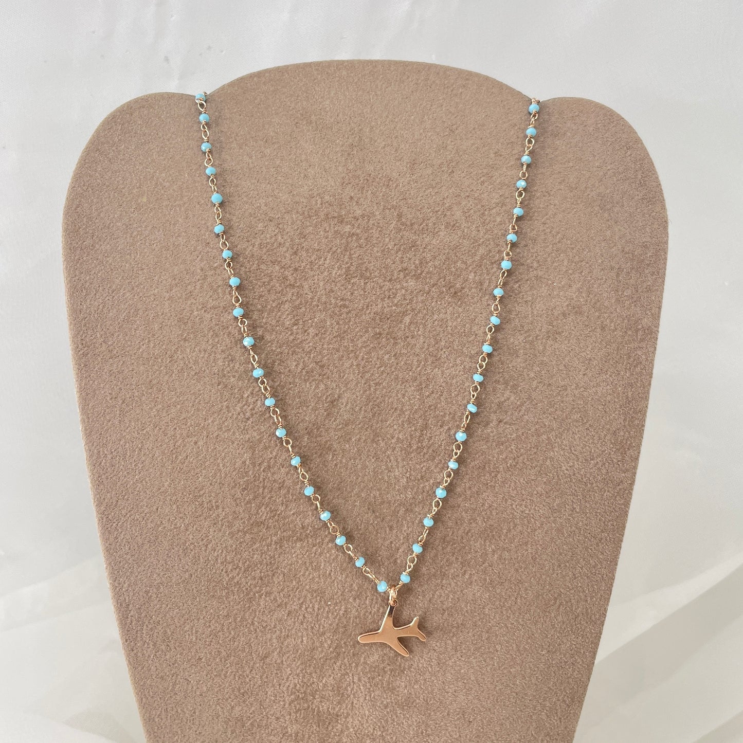 Collana micro cristalli azzurro cielo cm 35 con aereo pendente - pezzo unico - Lumiere Bijoux