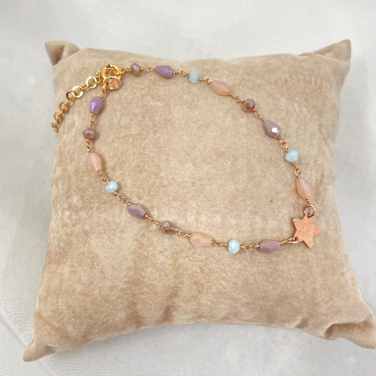 Bracciale cristalli azzurro e cipria cm 17 con soggetto battuto in linea rosè - pezzi unici