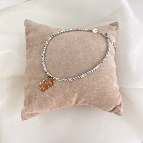 Bracciale a sfere diamantate con casetta rosè pendente - Lumiere Bijoux