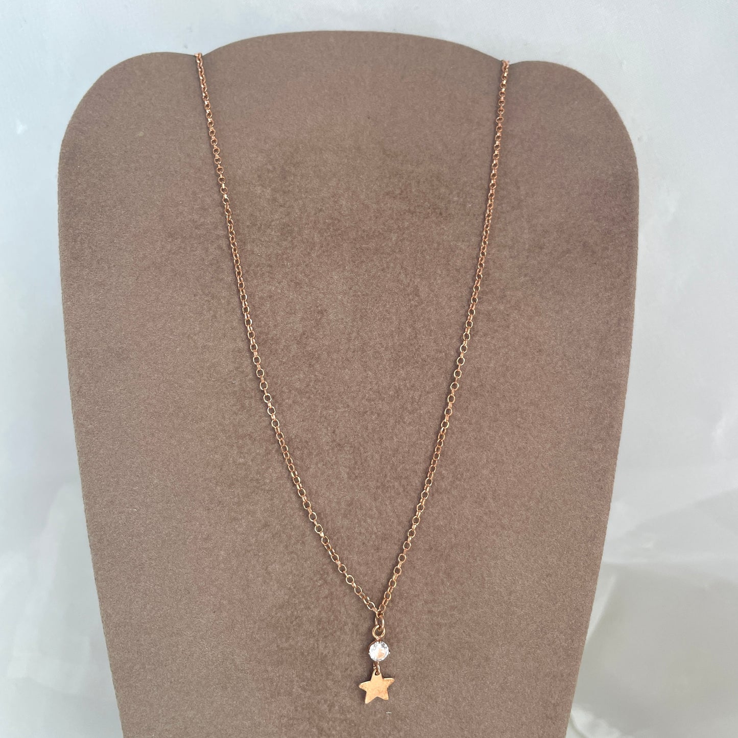 Collana catena rolló cm 40 con punto luce e stella da 0,8 rosè - pezzo unico