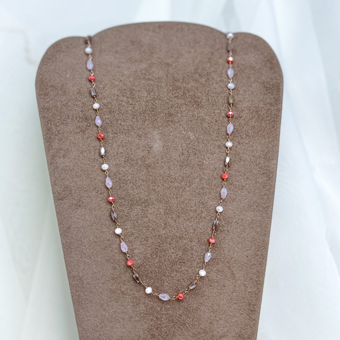 Collana cristalli rosa, rosso corallo, marrone cm 40