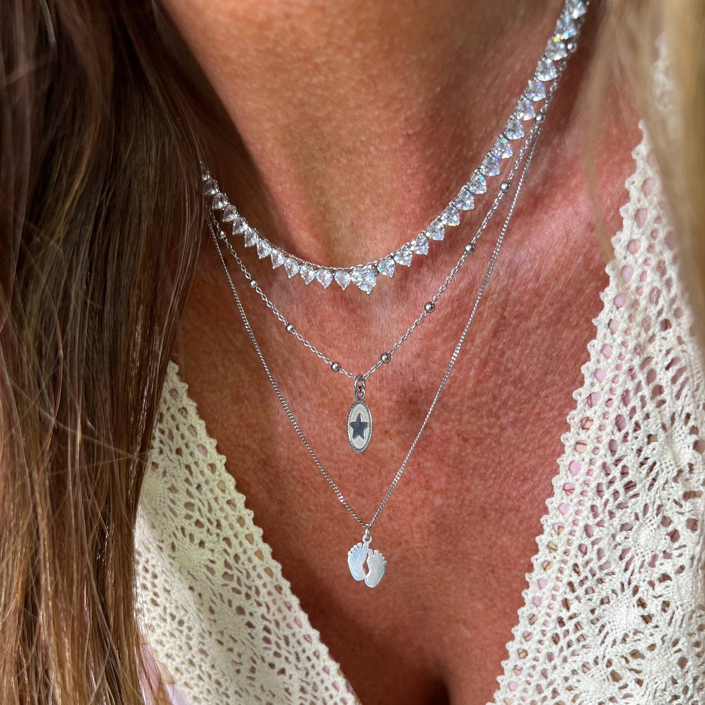 Choker tennis zirconi bianchi multicuori con cuore centrale - cm 40 - pezzo unico