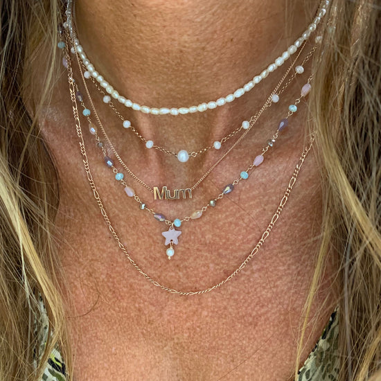 Collana cristalli cipriati con stella smaltata cipria con perla pendente cm 40