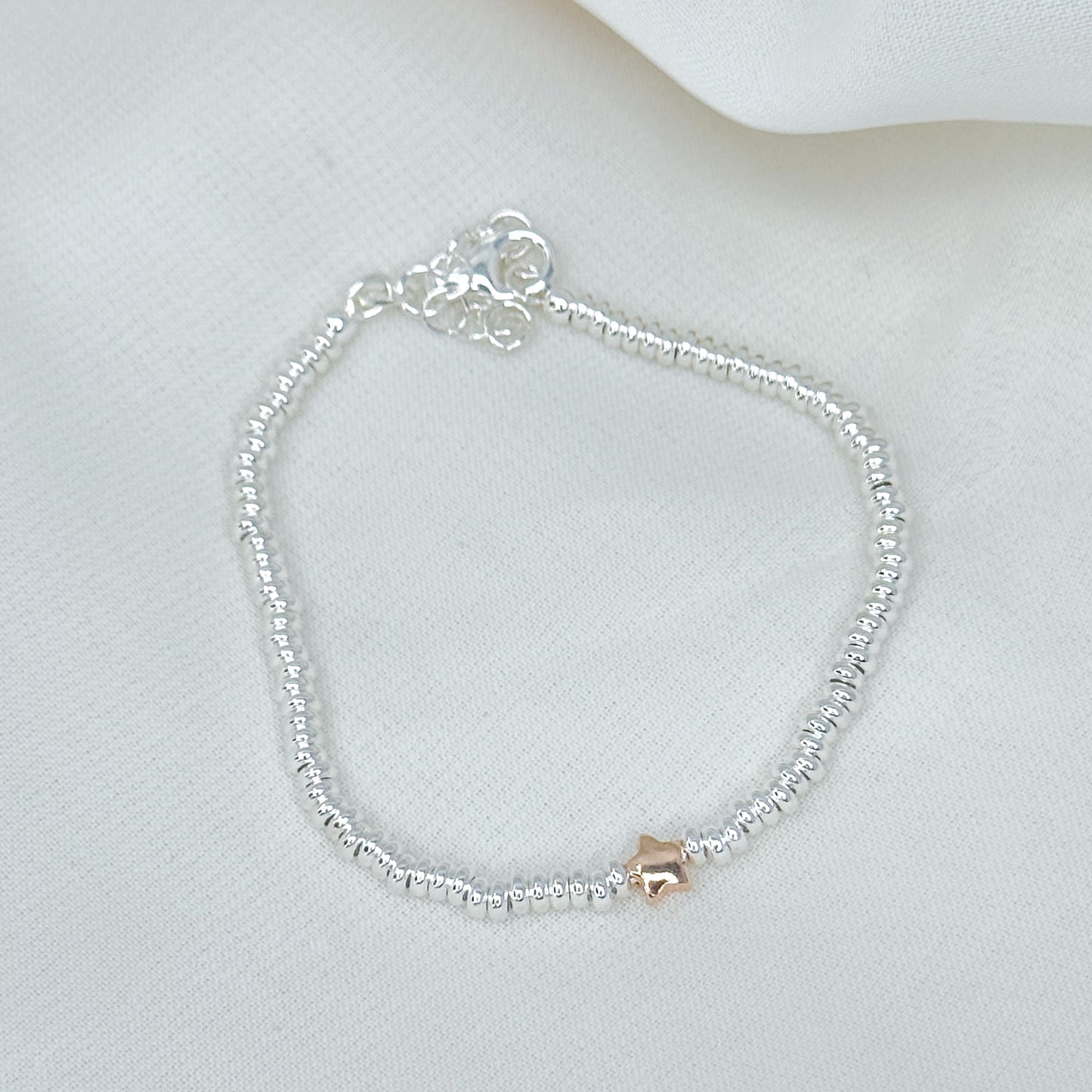 Bracciale sfere schiacciate argento 925 con stella o cuore rosé in linea - Lumiere Bijoux