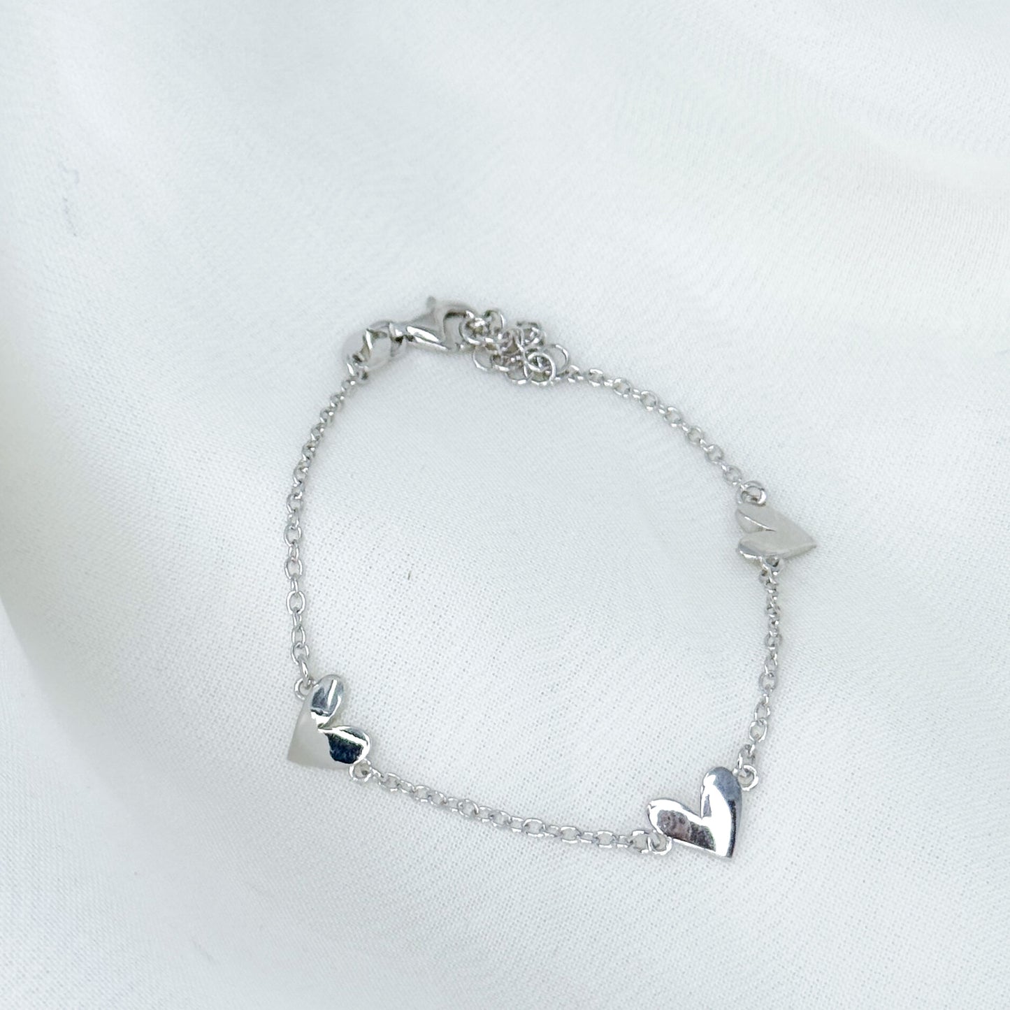 Bracciale catena forzatina con tre cuori in argento 925 - Lumiere Bijoux