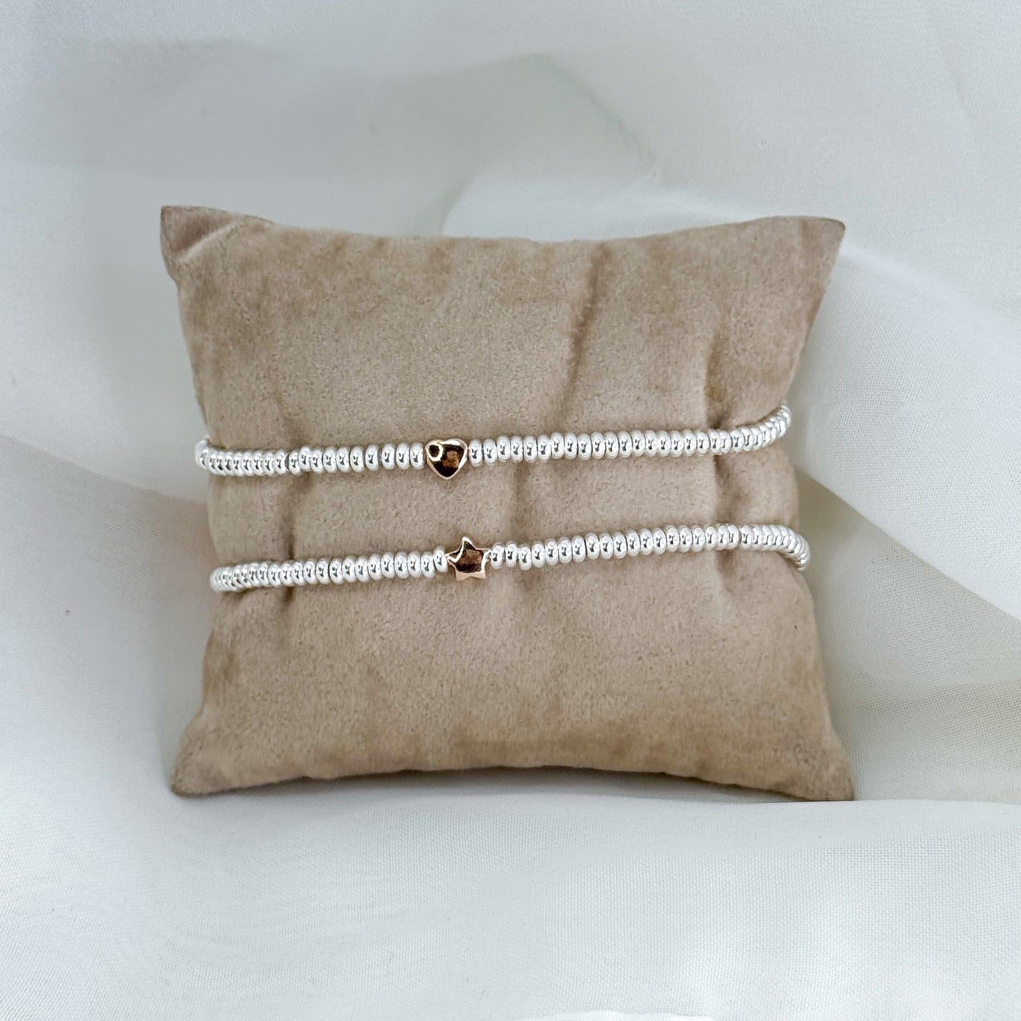 Bracciale sfere schiacciate argento 925 con stella o cuore rosé in linea - Lumiere Bijoux