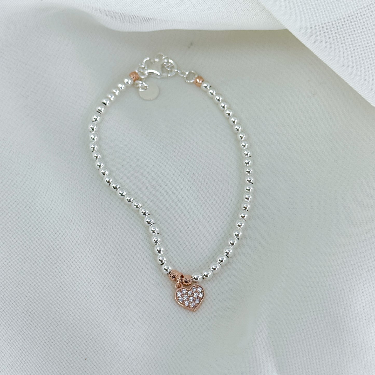 Bracciale sfere argento 925 con cuore - stella o quadrifoglio con zirconi pendente base rosé - Lumiere Bijoux