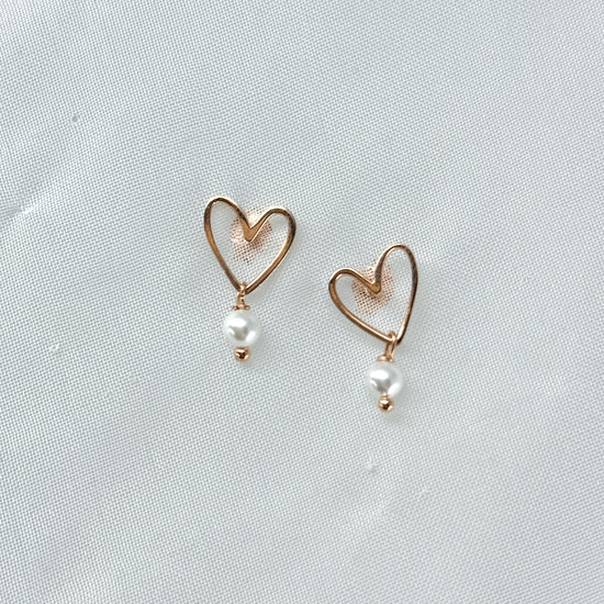 Coppia orecchini cuori vuoti Mykonos da 1 cm rosè con perla o punto luce pendente - Lumiere Bijoux
