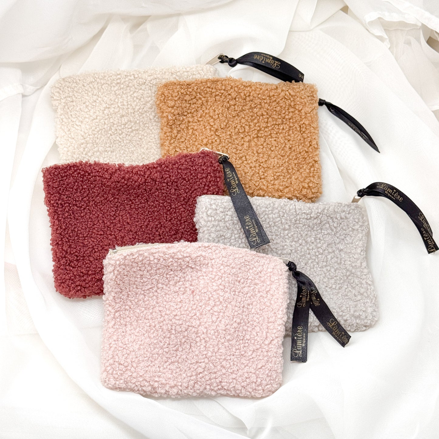 Pochette con zip tessuto Teddy - Lumiere Bijoux