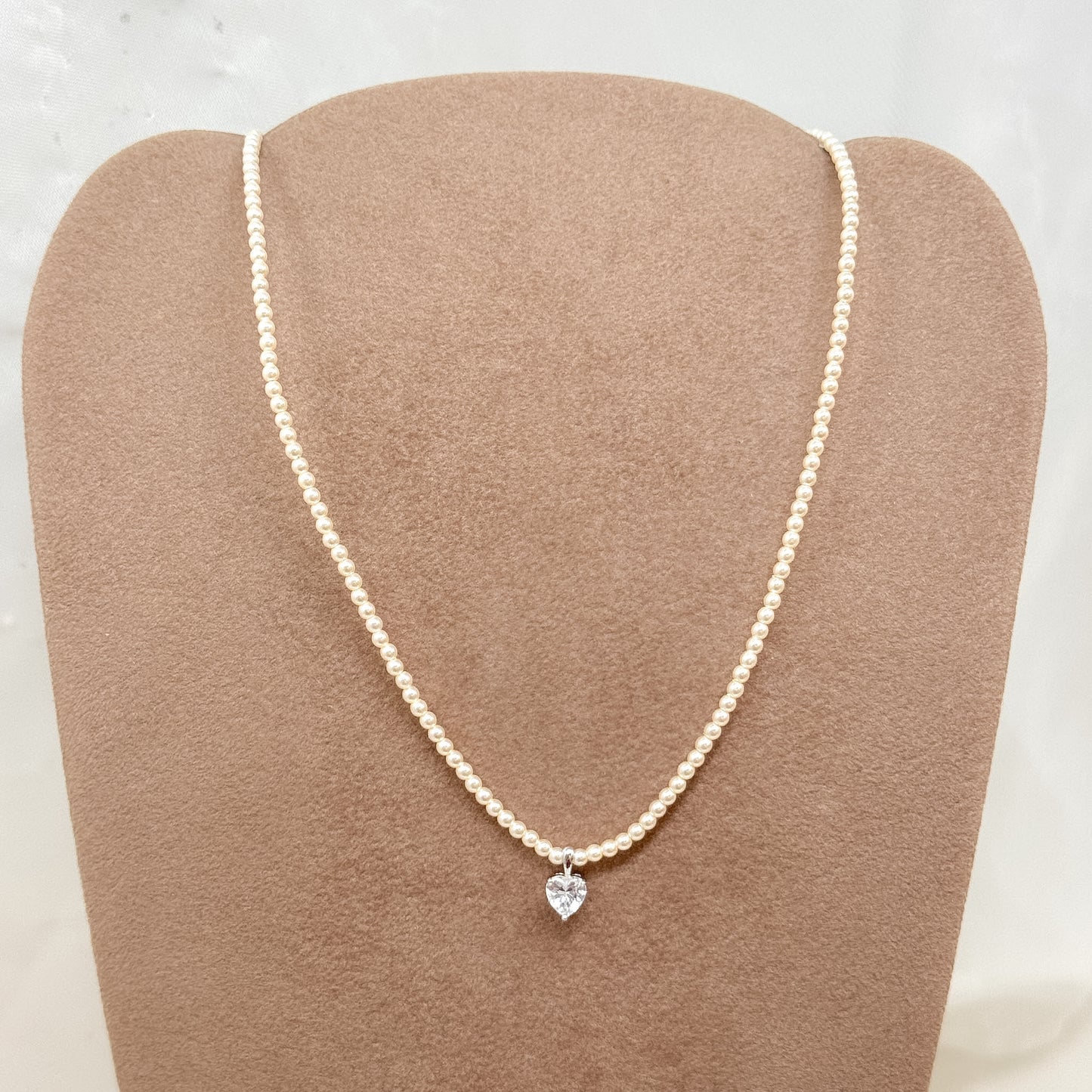 Collana microperle tonde shell con zircuore pendente 38cm