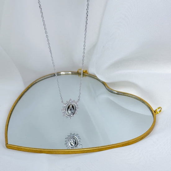 Collana rollò rodiata cm 40 con madonnina e corolla zirconi