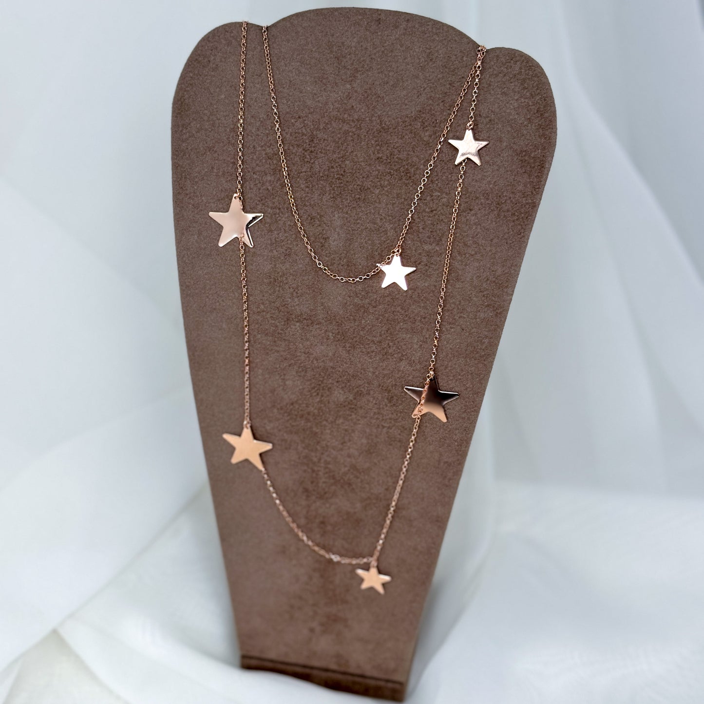 Collana lunga con stelle pendenti