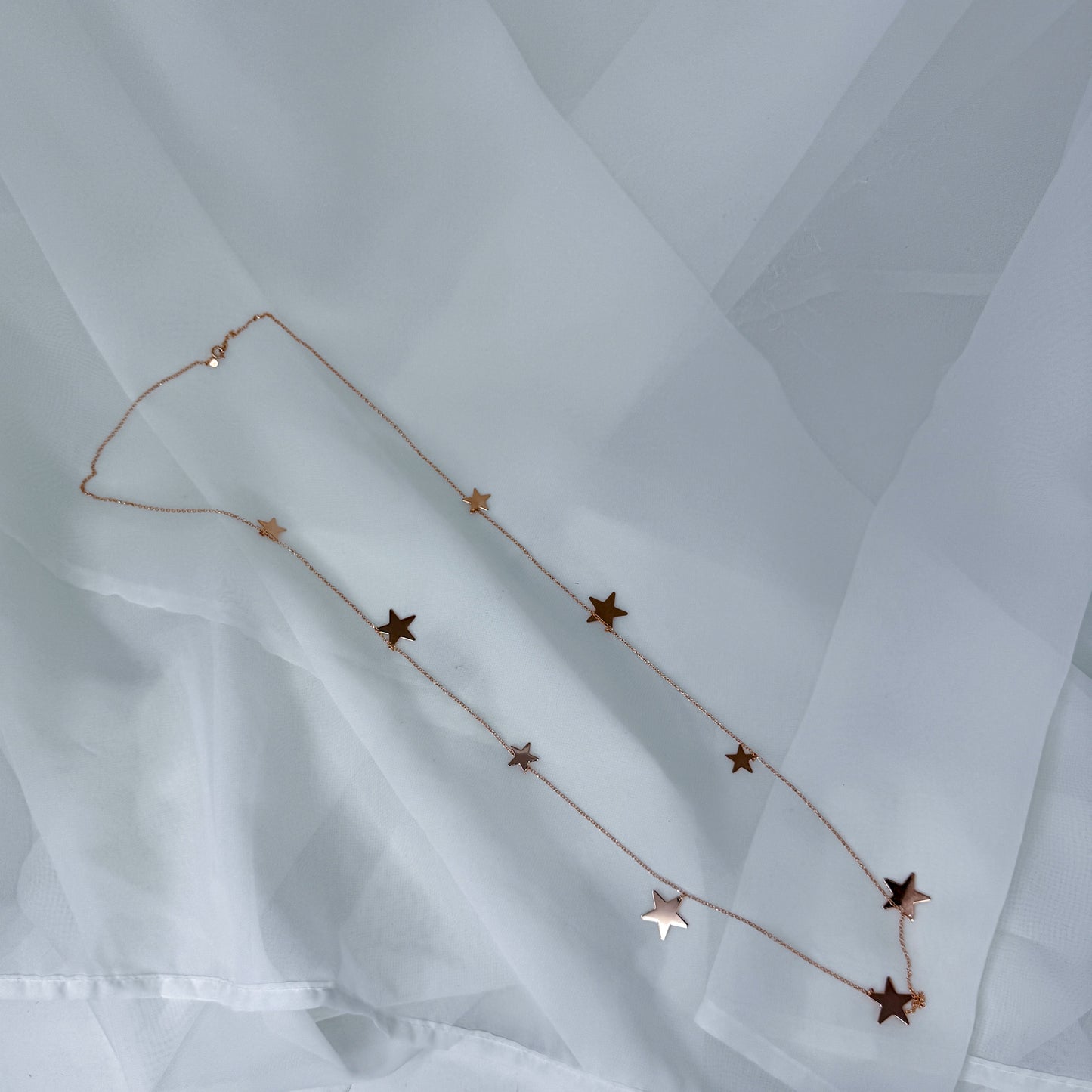 Collana lunga con stelle pendenti