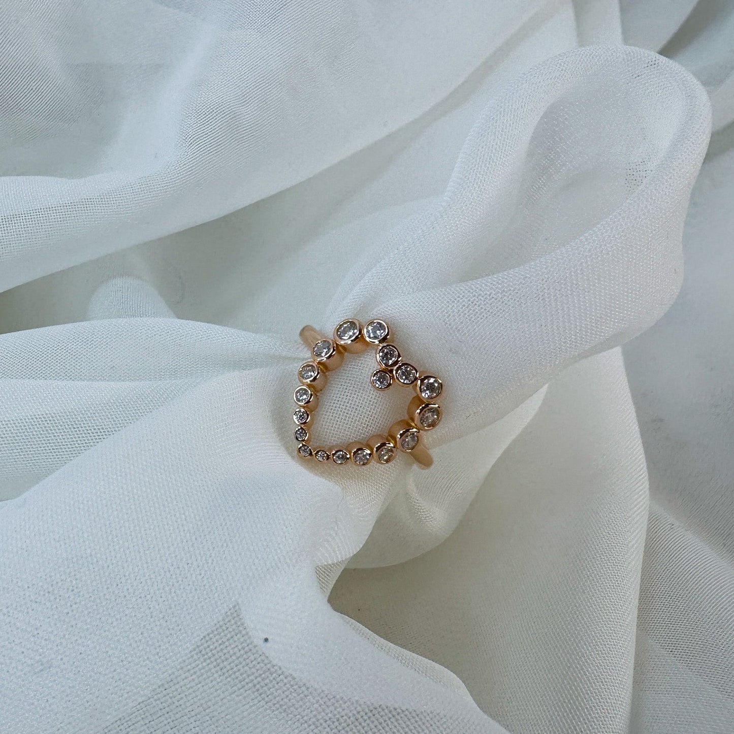 Anello regolabile con cuore vuoto di zirconi bolle - Lumiere Bijoux