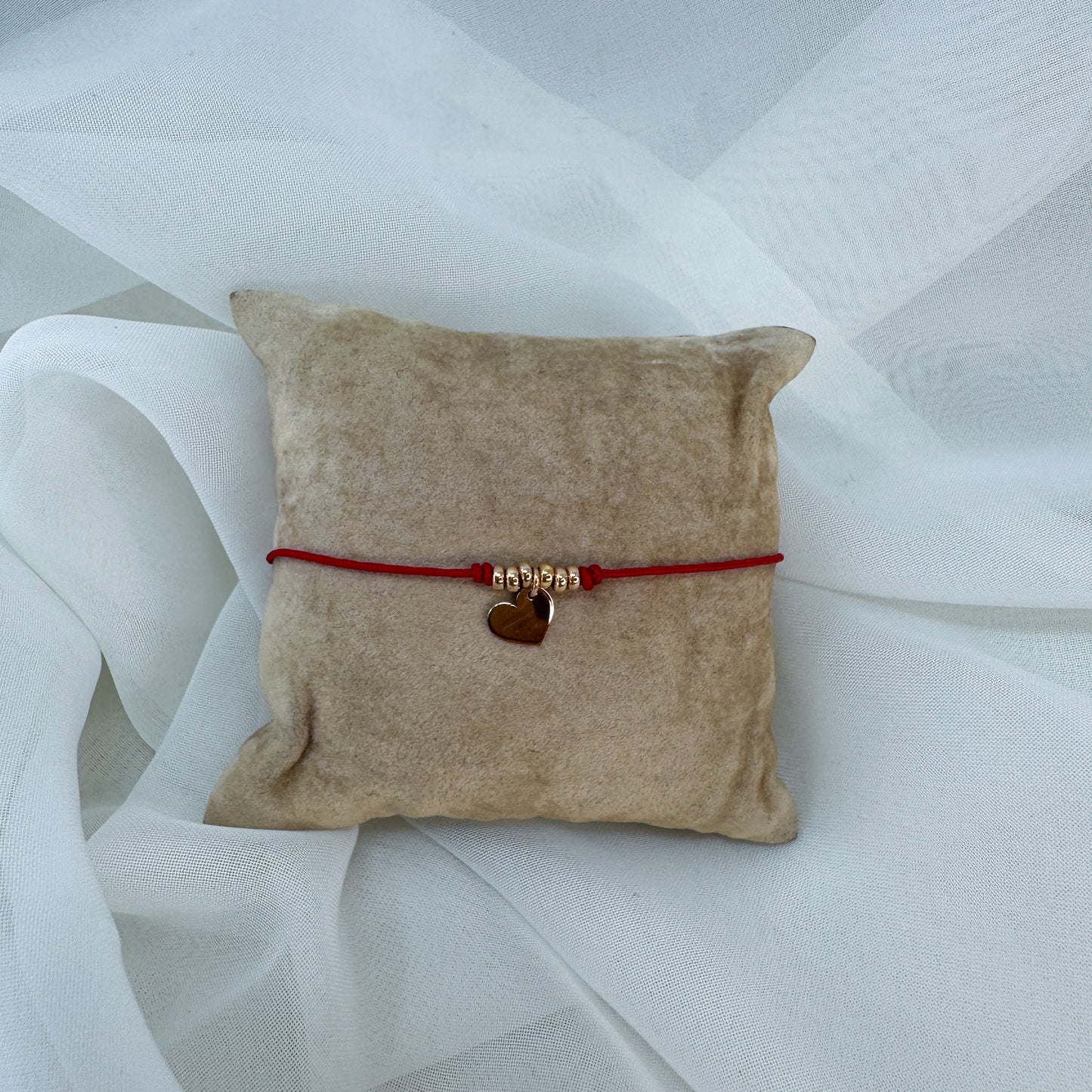 Bracciale cordino rosso regolabile con cuore liscio pendente e pepite rosé - Lumiere Bijoux