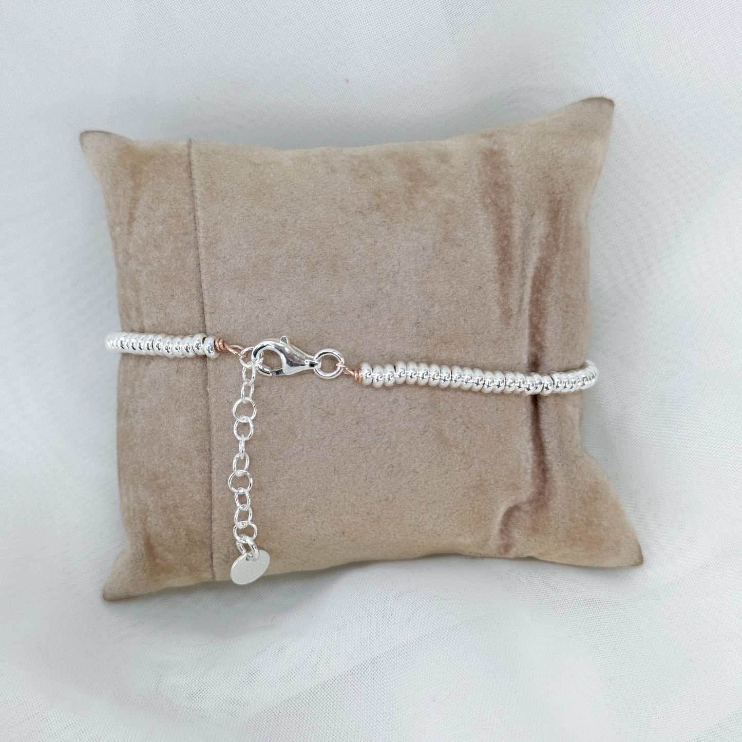 Bracciale in argento con cuori intrecciati rosé - Lumiere Bijoux