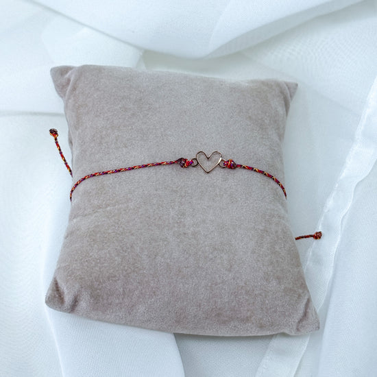 Bracciale cordino regolabile colorato cuore vuoto Mykonos in linea - Lumiere Bijoux