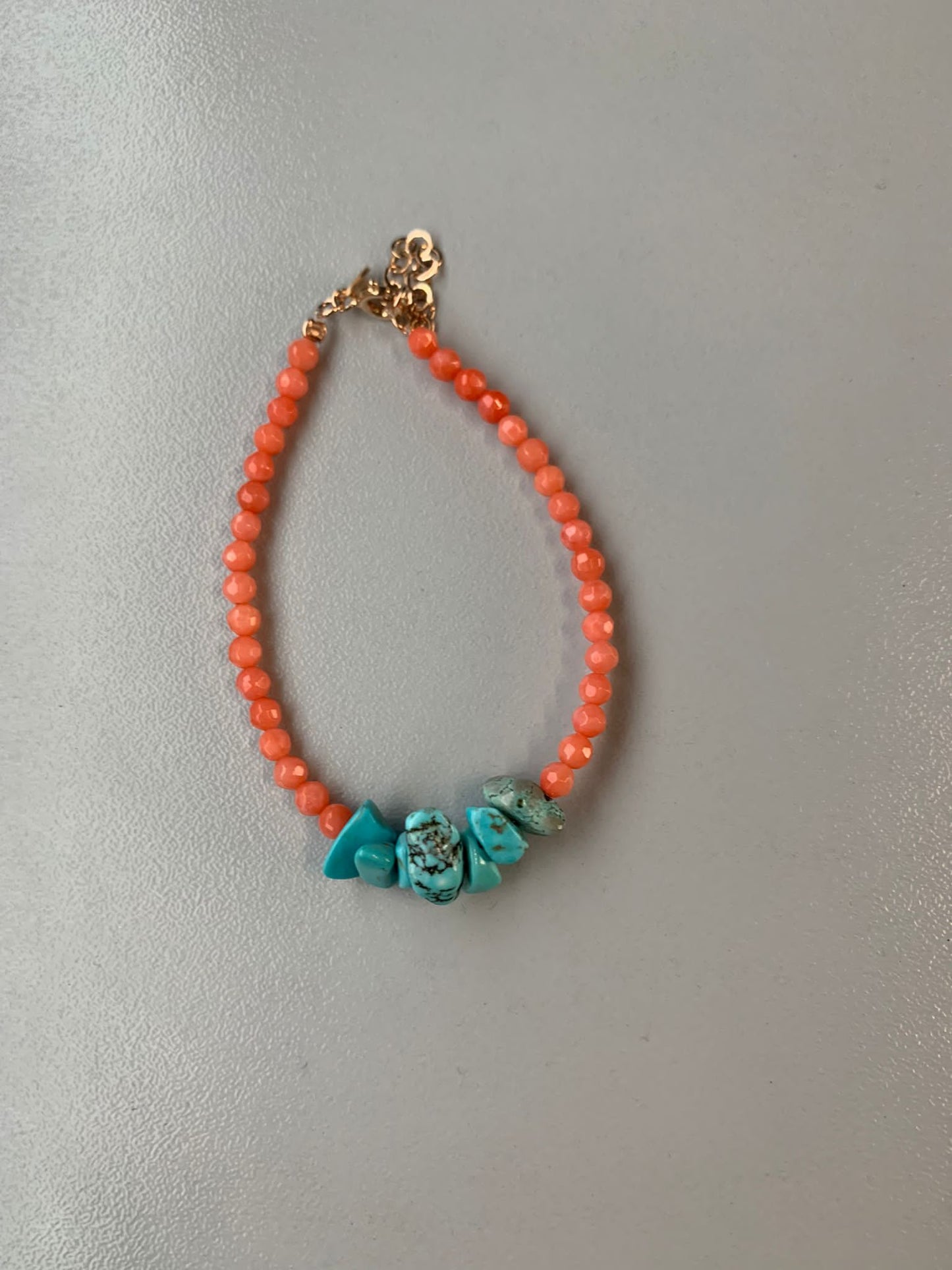 Bracciale cristalli arancioni e pietre a forma di coralli azzurri cm 17