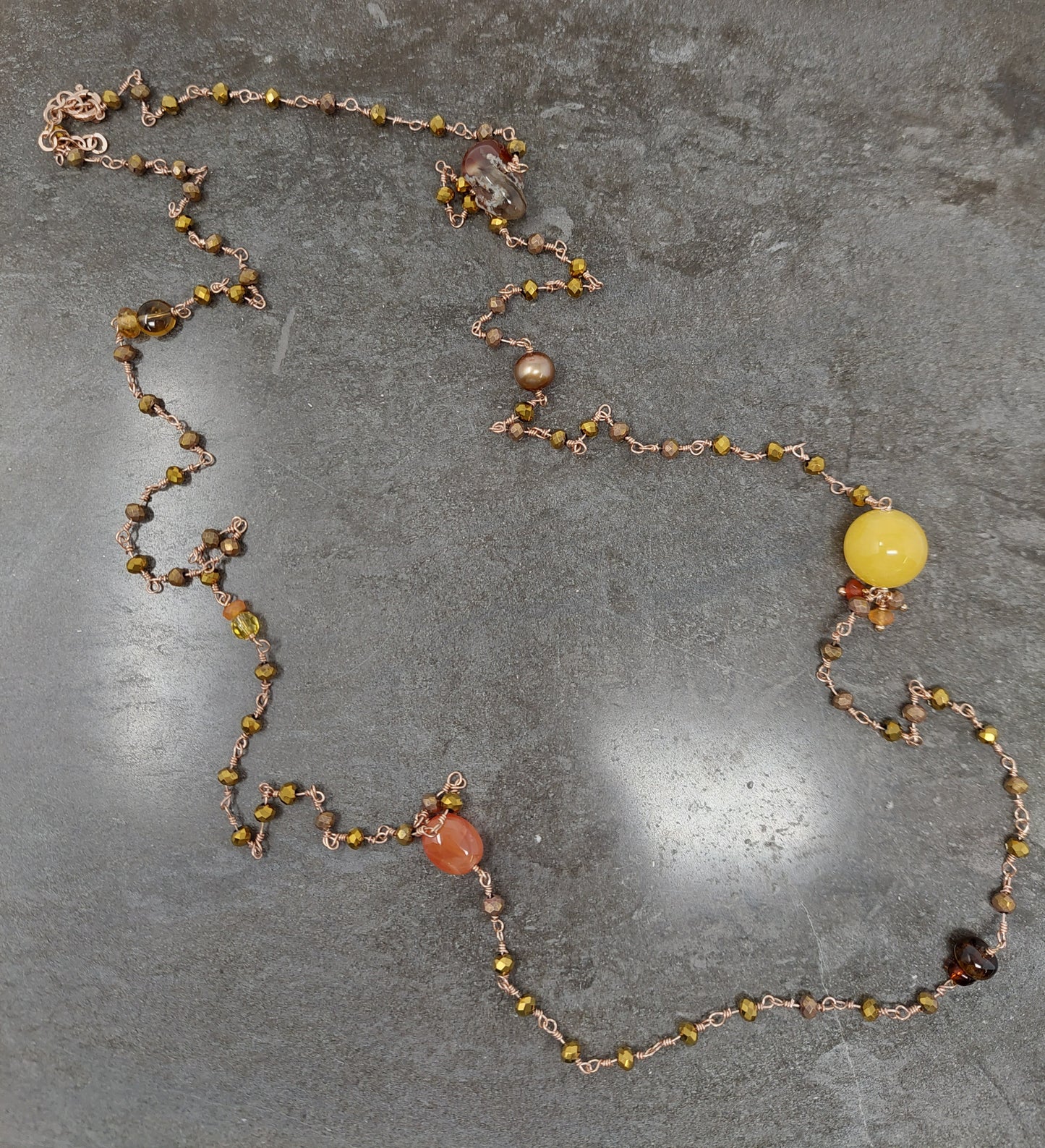 Collana cristalli bronzo/oro con pietre in linea - cm 90