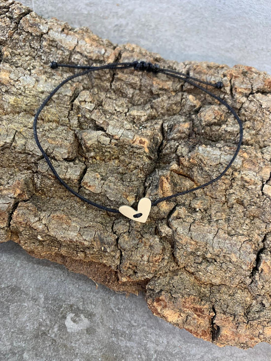 Bracciale cuore Formentera da 1 cm circa con cordino nero regolabile