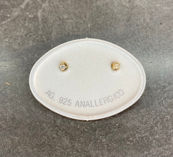 Coppia orecchini punti luce micro micro diametro 0,2 mm.
